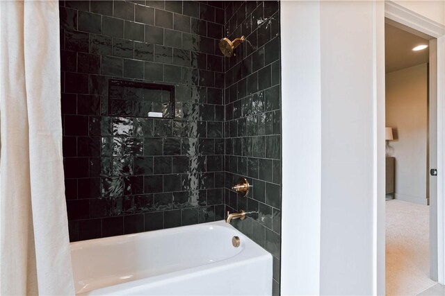 3228 Bradley Ln, Auburn, AL 36830 - bathroom featuring shower / bathtub combination with curtain
