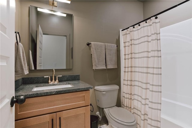 3228 Bradley Ln, Auburn, AL 36830 - bathroom featuring toilet, vanity, and shower / tub combo