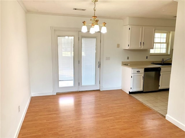 kitchen with a notable chandelier, visible vents, dishwasher, and white cabinetry