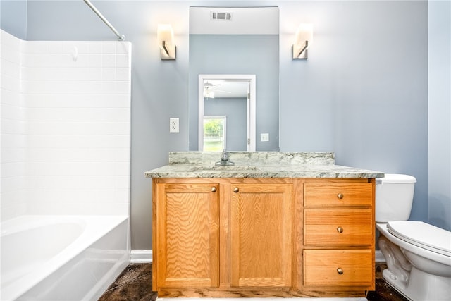 bathroom featuring a ceiling fan, vanity, shower / washtub combination, toilet, and visible vents