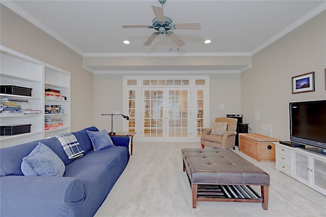 living room featuring carpet, french doors, ornamental molding, a ceiling fan, and recessed lighting