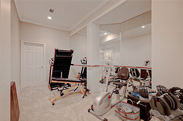workout room with ornamental molding, carpet, and recessed lighting