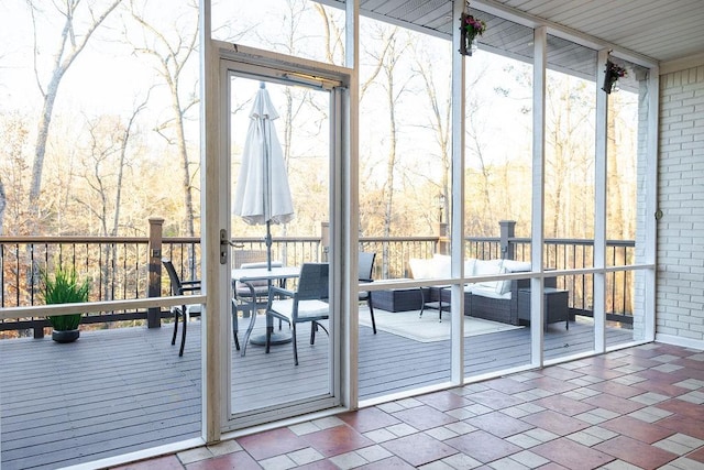 doorway to outside with expansive windows