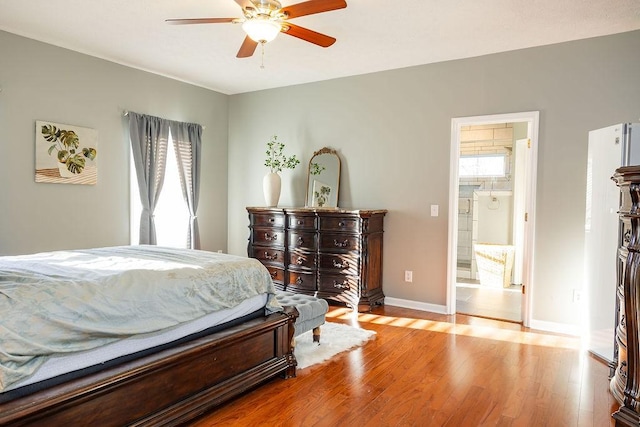 bedroom featuring ceiling fan and light hardwood / wood-style flooring