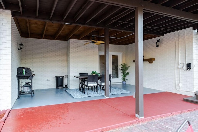 view of patio / terrace featuring area for grilling and ceiling fan