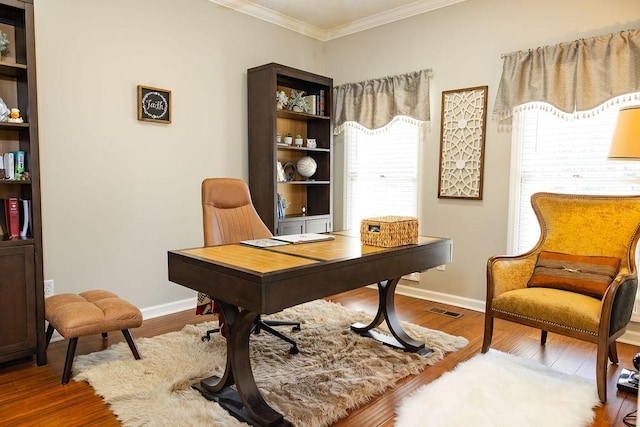 office space featuring wood-type flooring and ornamental molding