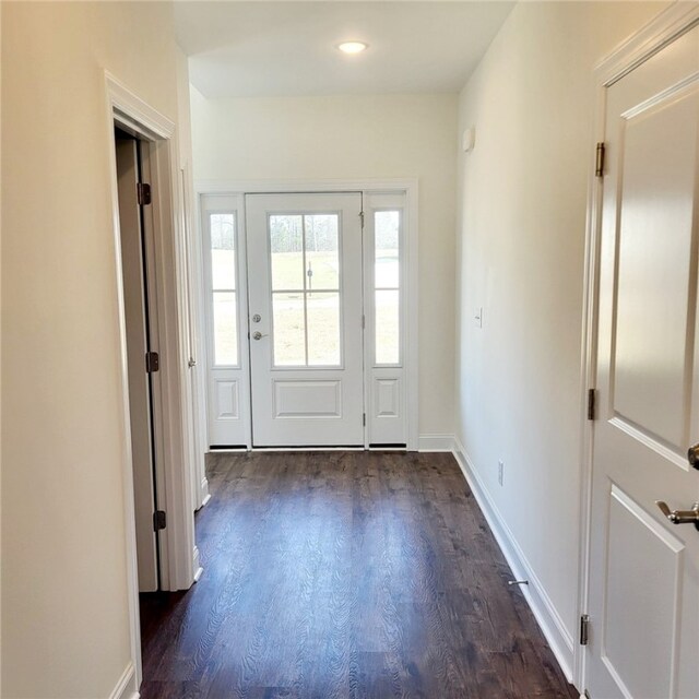 705 Riverside Ests, Lanett, AL 36863 - doorway to outside with baseboards and dark wood-style flooring