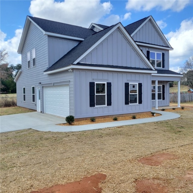 705 Riverside Ests, Lanett, AL 36863 - view of property exterior featuring concrete driveway, a lawn, board and batten siding, and a shingled roof