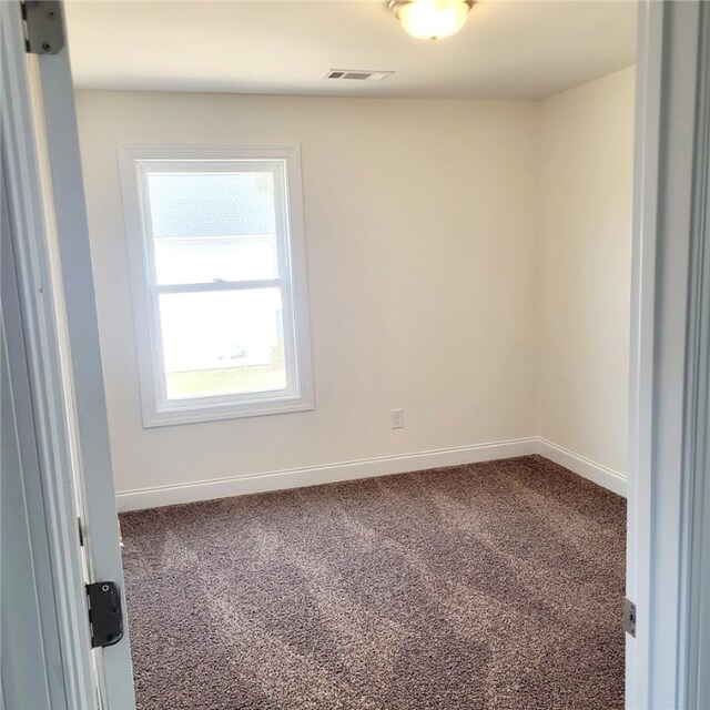705 Riverside Ests, Lanett, AL 36863 - unfurnished room with carpet flooring, visible vents, and baseboards