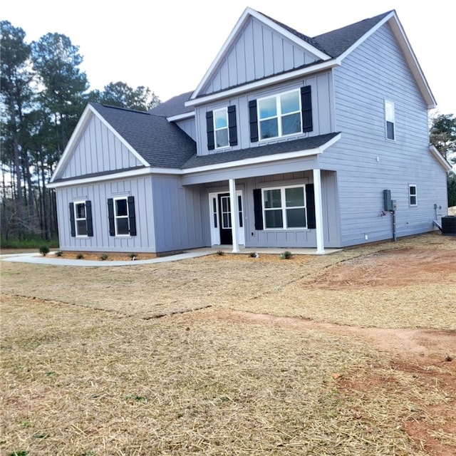 705 Riverside Ests, Lanett, AL 36863 - view of front of house featuring a porch, central air condition unit, board and batten siding, and a shingled roof