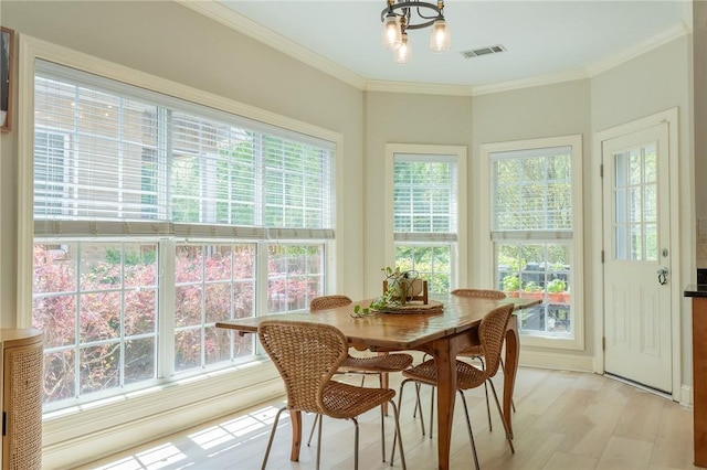 1714 Vfw Rd, Auburn, AL 36830 - sunroom with healthy amount of natural light and a chandelier