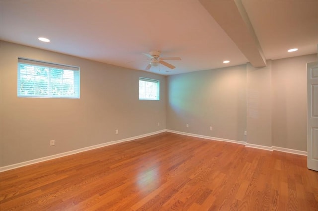 empty room featuring light wood-style flooring, ceiling fan, baseboards, and recessed lighting