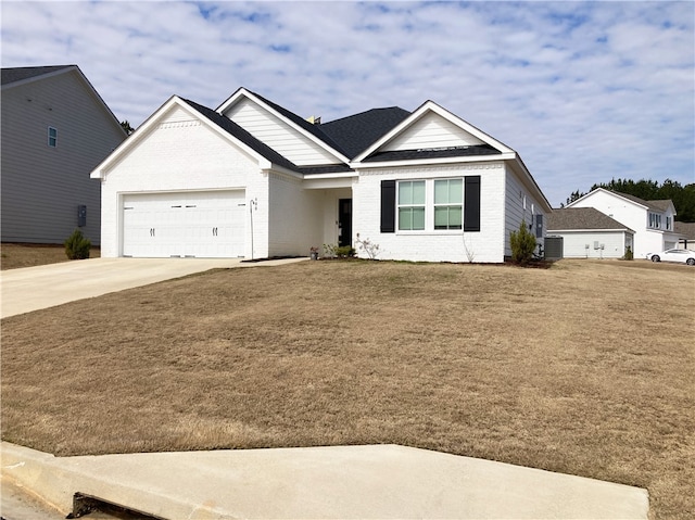 ranch-style house with concrete driveway, brick siding, an attached garage, and a front yard