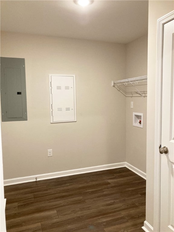 washroom with laundry area, electric panel, baseboards, dark wood-style flooring, and hookup for a washing machine