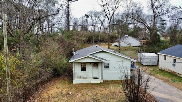 336 Byrd St, Auburn, AL 36832 - view of outbuilding featuring asphalt driveway