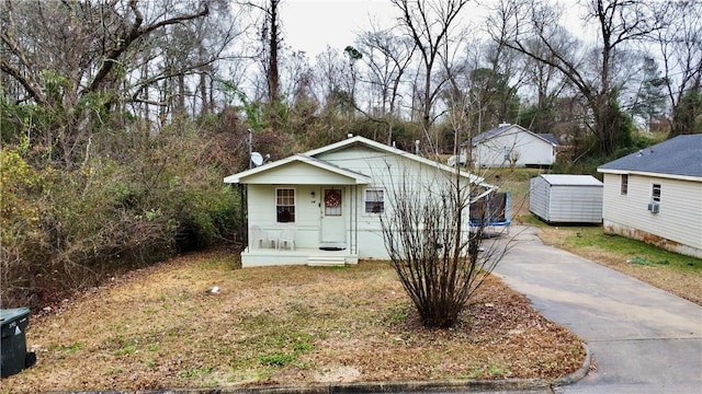 336 Byrd St, Auburn, AL 36832 - view of front of home featuring asphalt driveway and covered porch