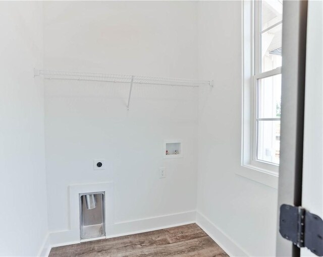 8 Crossing Ct E, Valley, AL 36854 - laundry area featuring washer hookup, hookup for an electric dryer, and wood finished floors