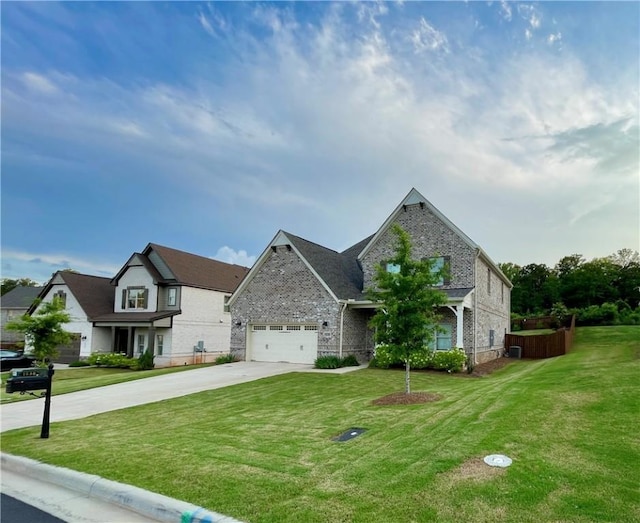 1836 Waterfall Rd, Auburn, AL 36830 - view of front of home with concrete driveway, a front lawn, brick siding, and a garage