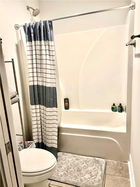 1836 Waterfall Rd, Auburn, AL 36830 - bathroom featuring tile patterned floors and shower / tub combo with curtain