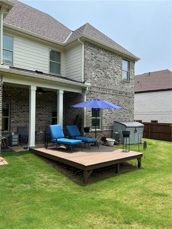 1836 Waterfall Rd, Auburn, AL 36830 - back of property with a deck, brick siding, and roof with shingles