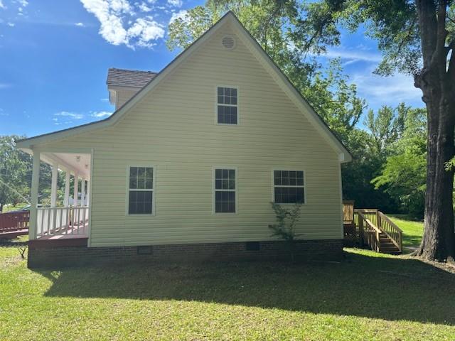 2420 38th Blvd, Valley, AL 36854 - rear view of house featuring crawl space, a lawn, and a wooden deck