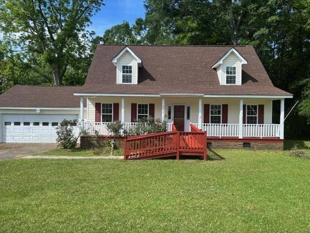 2420 38th Blvd, Valley, AL 36854 - cape cod-style house with a porch, an attached garage, driveway, and a front lawn