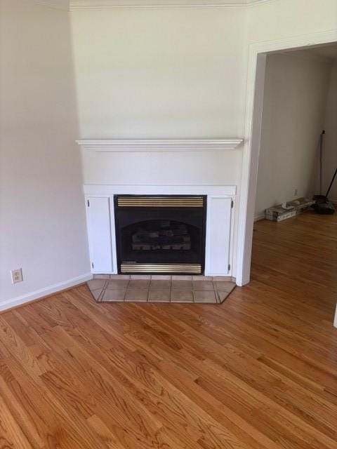 2420 38th Blvd, Valley, AL 36854 - detailed view of wood finished floors, a fireplace, and baseboards