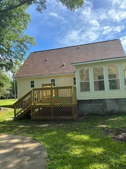 2420 38th Blvd, Valley, AL 36854 - back of house with a yard, a deck, and a shingled roof