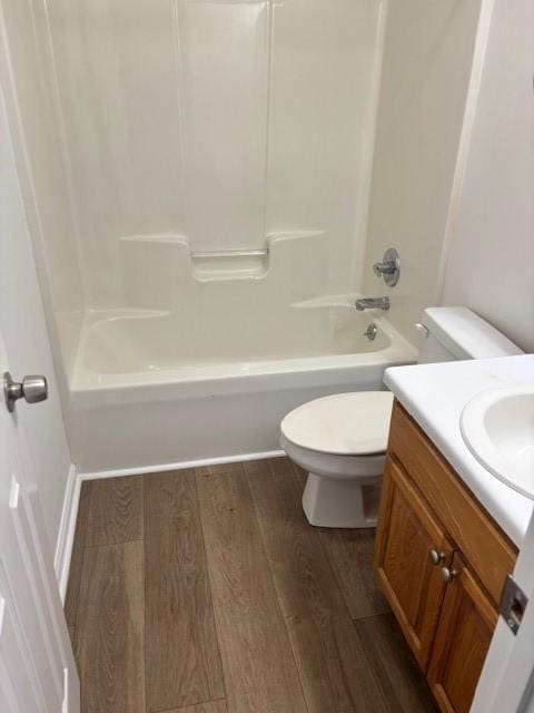 2420 38th Blvd, Valley, AL 36854 - bathroom with wood finished floors, toilet, bathtub / shower combination, and vanity