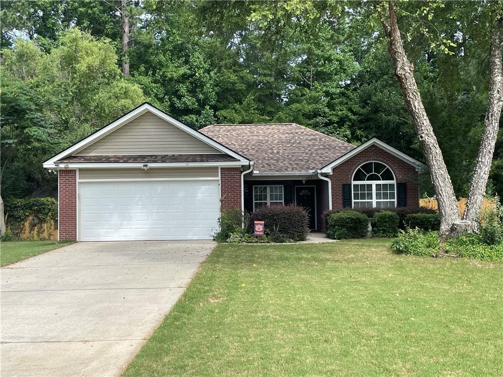 1473 Townsend Ct, Auburn, AL 36830 - single story home featuring brick siding, a front lawn, concrete driveway, a garage, and roof with shingles