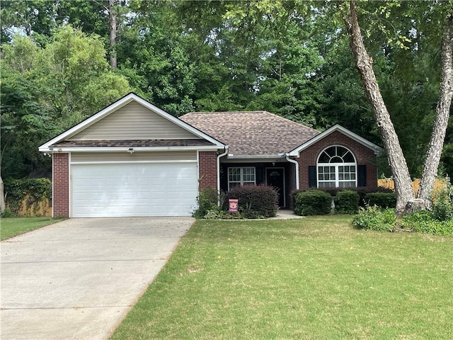 1473 Townsend Ct, Auburn, AL 36830 - single story home featuring brick siding, a front lawn, concrete driveway, a garage, and roof with shingles