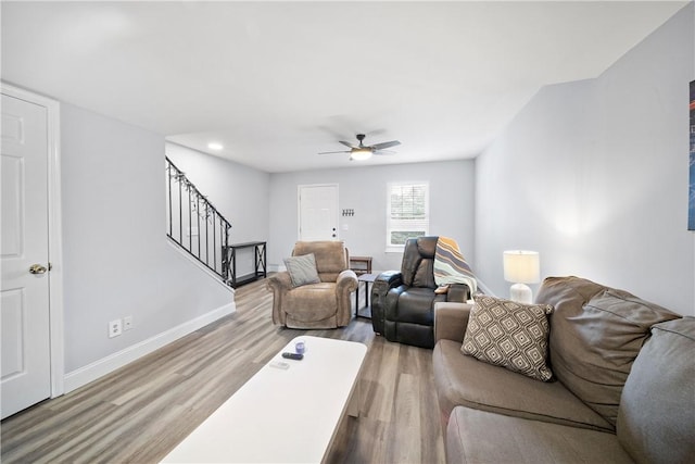 1761 Wire Rd Unit 409, Auburn, AL 36830 - living room featuring stairs, wood finished floors, a ceiling fan, and recessed lighting