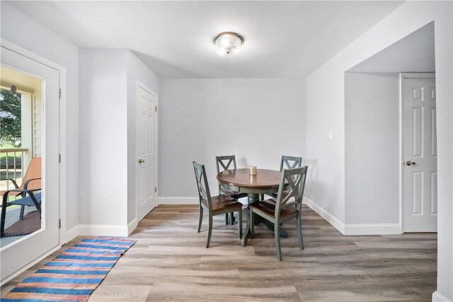 1761 Wire Rd Unit 409, Auburn, AL 36830 - dining area with wood finished floors and baseboards