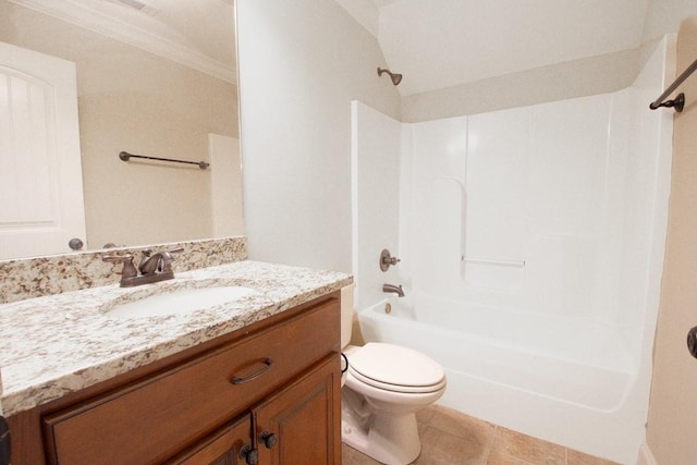 full bathroom with bathing tub / shower combination, tile patterned flooring, vanity, ornamental molding, and toilet