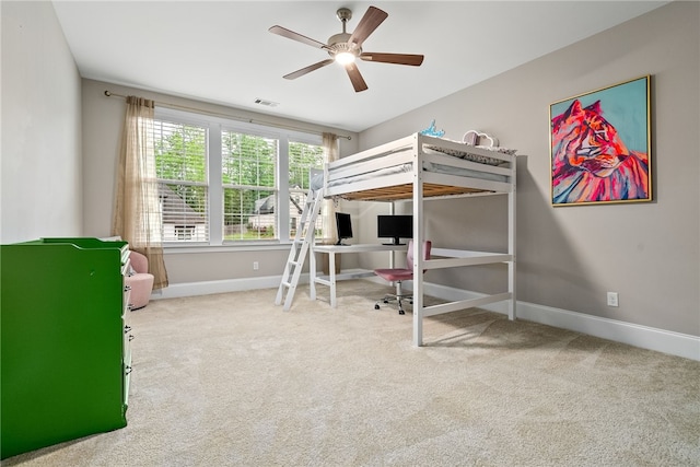 bedroom featuring carpet flooring, a ceiling fan, baseboards, and visible vents