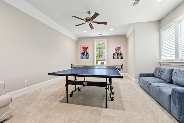 rec room featuring carpet floors, ceiling fan, a wealth of natural light, and baseboards