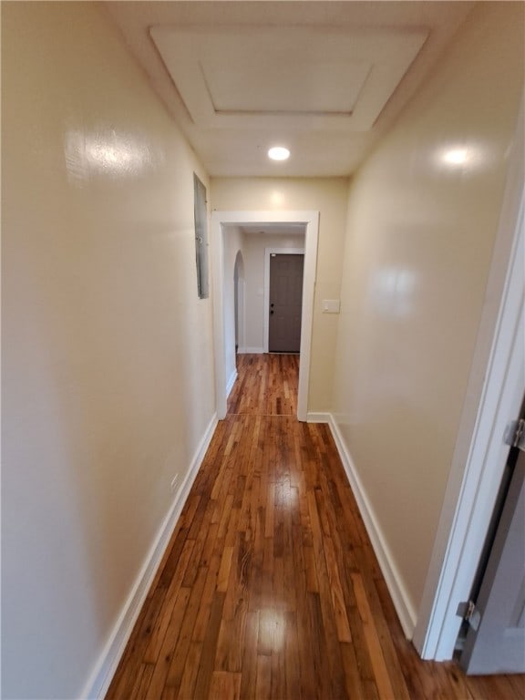 hallway featuring wood-type flooring