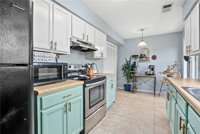 kitchen with hanging light fixtures, green cabinetry, white cabinets, and appliances with stainless steel finishes