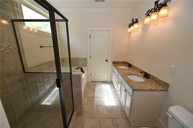 227 Westover St, Auburn, AL 36832 - bathroom with a garden tub, a shower stall, crown molding, double vanity, and tile patterned flooring