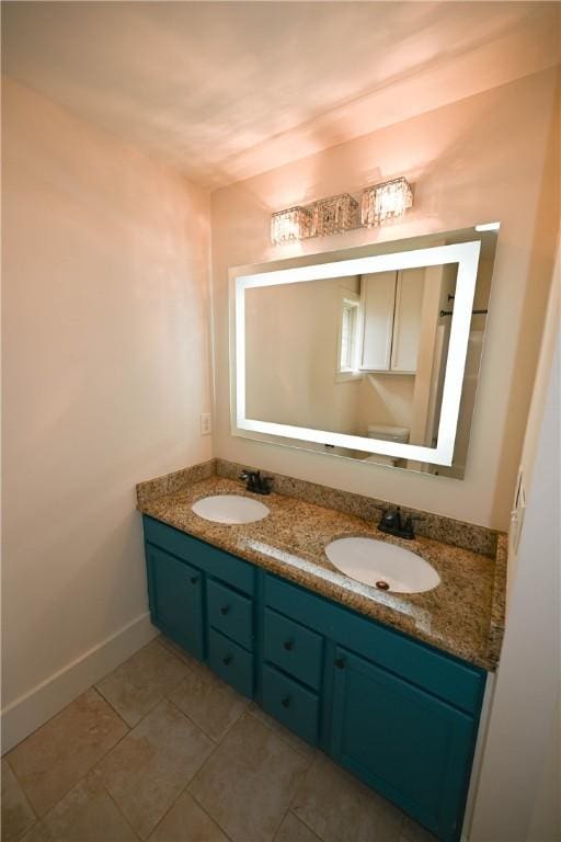 227 Westover St, Auburn, AL 36832 - bathroom featuring double vanity and tile patterned floors