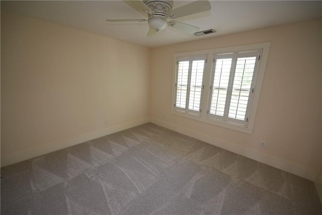 227 Westover St, Auburn, AL 36832 - empty room with light carpet and ceiling fan