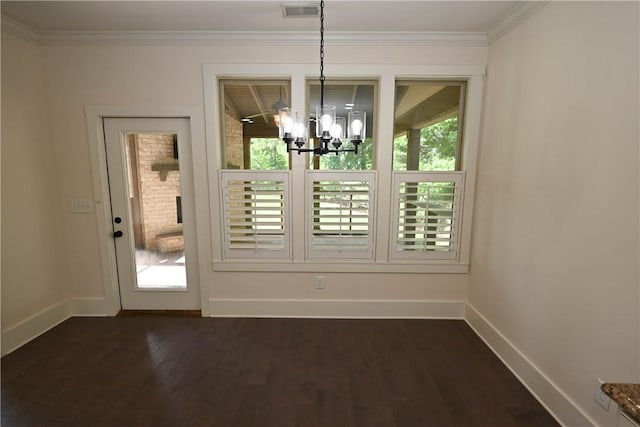 227 Westover St, Auburn, AL 36832 - unfurnished dining area with a chandelier, dark wood finished floors, and ornamental molding