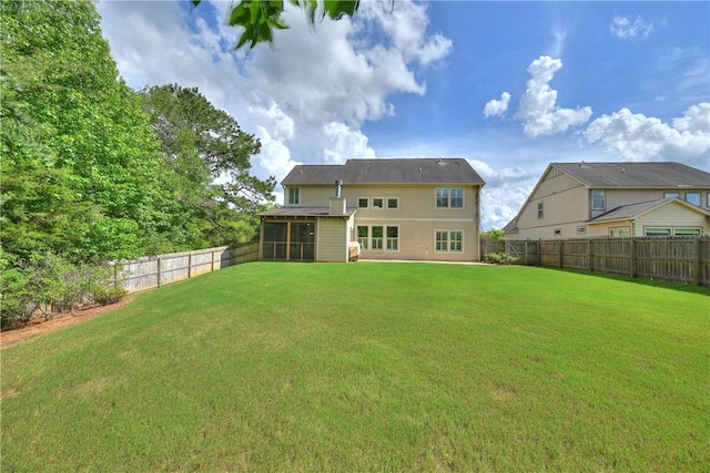227 Westover St, Auburn, AL 36832 - back of property with a fenced backyard and a sunroom