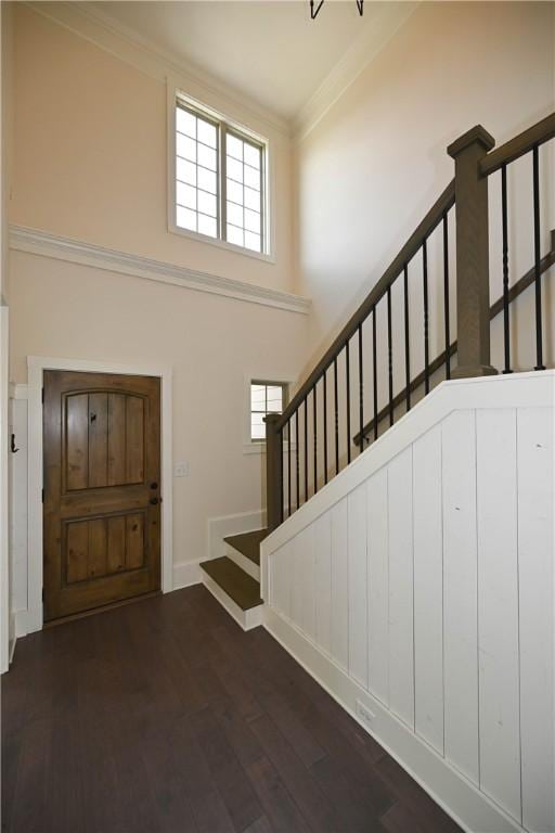 227 Westover St, Auburn, AL 36832 - entryway featuring a towering ceiling, stairway, plenty of natural light, ornamental molding, and wood finished floors