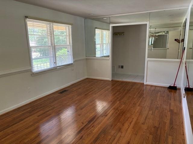 empty room featuring dark hardwood / wood-style floors