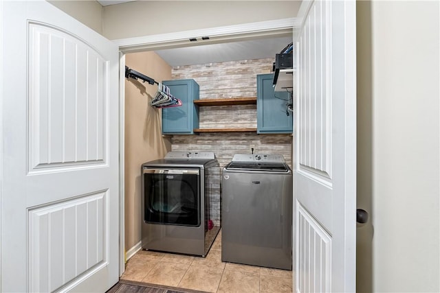 172 Solamere Ln, Auburn, AL 36832 - washroom with separate washer and dryer, cabinet space, light tile patterned floors, and electric panel
