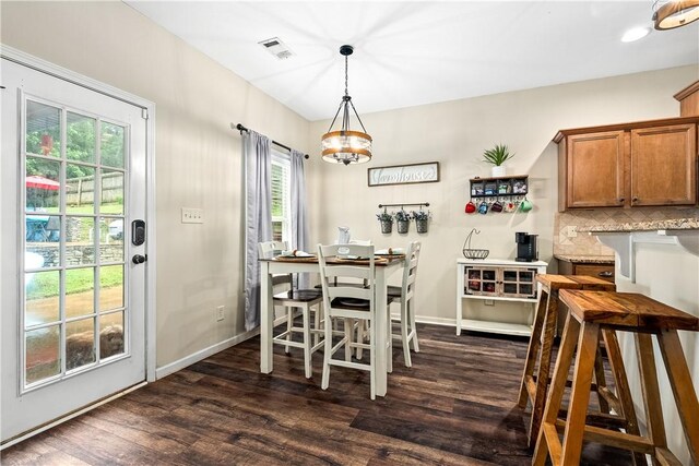 172 Solamere Ln, Auburn, AL 36832 - dining room featuring dark wood-type flooring and baseboards