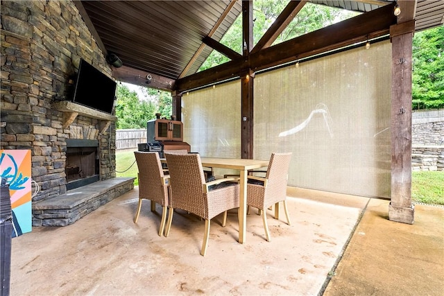 172 Solamere Ln, Auburn, AL 36832 - view of patio featuring an outdoor stone fireplace and outdoor dining space