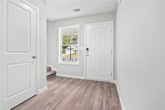 doorway to outside featuring light wood-type flooring