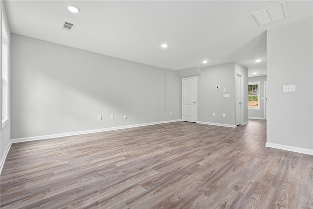 empty room with light wood-type flooring